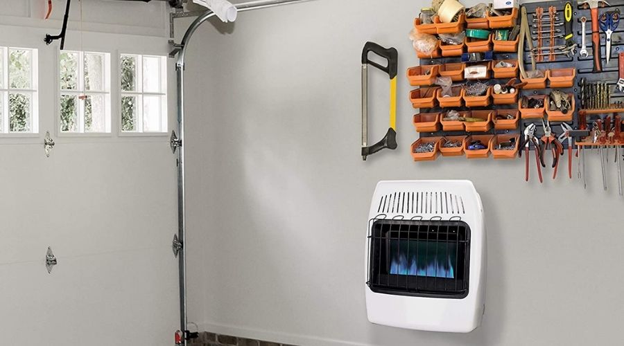 Are Propane Heaters safe in Garages? An image of Dyna-Glo 20,000 BTU Liquid Propane Blue Flame Vent Free Wall Heater in use to heat a room