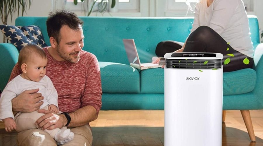 An image of a family using Waykar 4500 Sq. Ft Dehumidifier for Home Basements Bedroom Garage, one of the best garage dehumidifier models